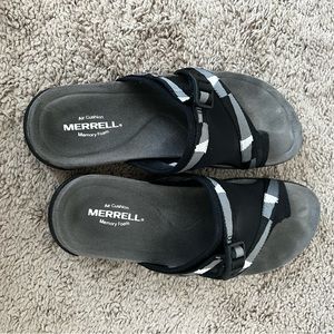 Sandals.  Comfy slip on inside black white tough fabric wmemory foam footbed.
